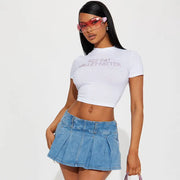 Side view of the midriff-baring short sleeve top